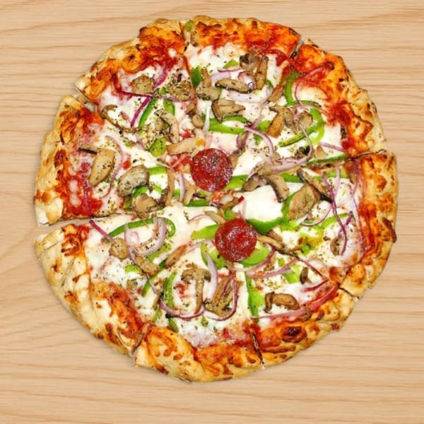 Babe's Pizza with pepperoni, mushrooms, green peppers, and red onions on a wooden surface.